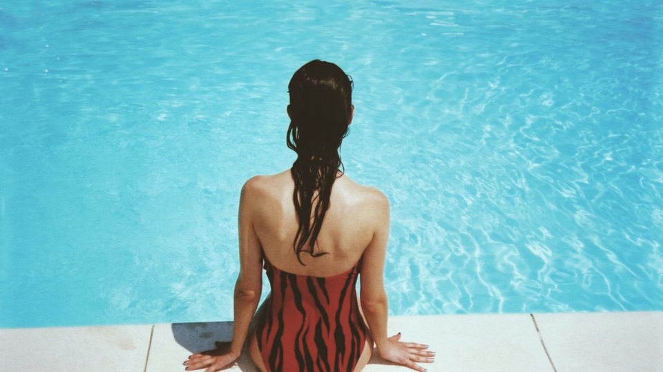 woman wearing black and red monokini