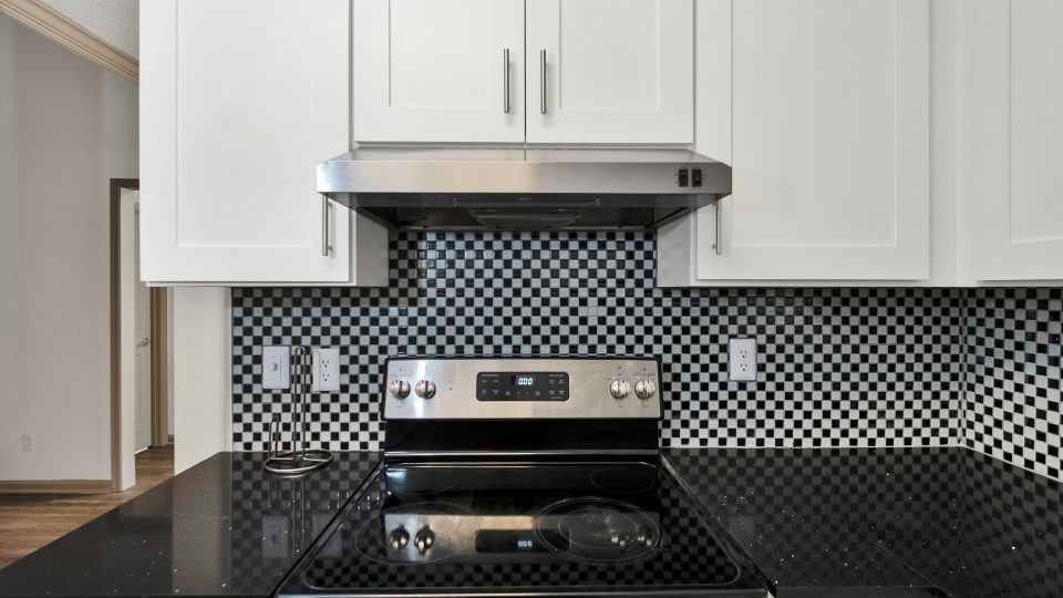 silver and black gas range