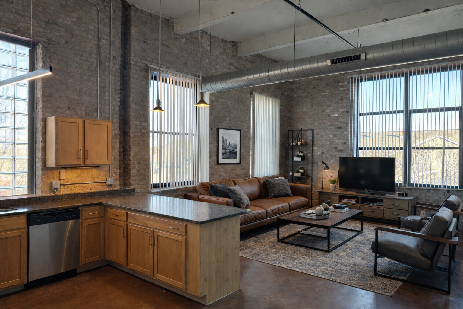 a living room filled with furniture and a large window