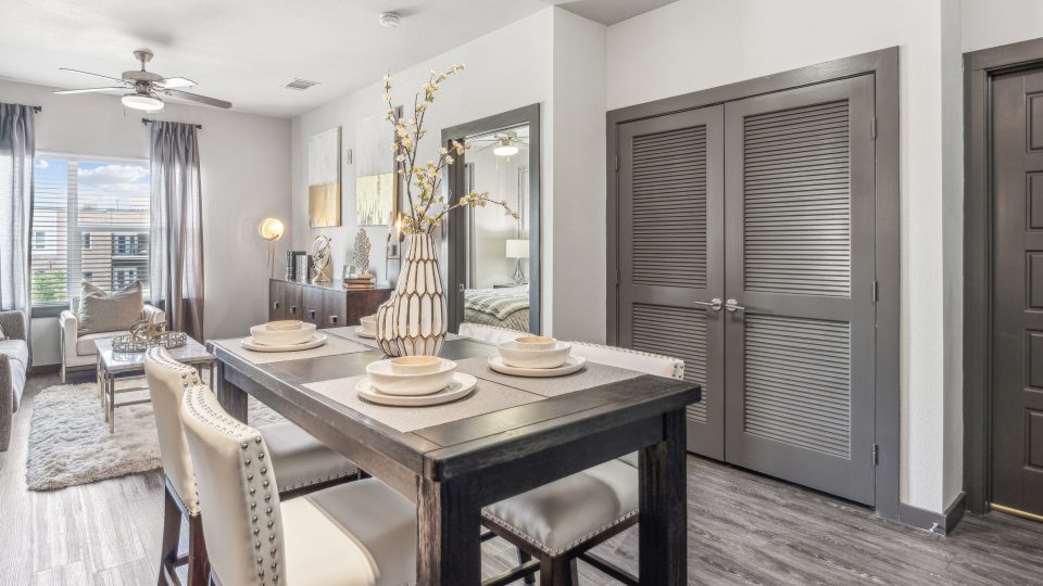 Dining room with table settings and chairs