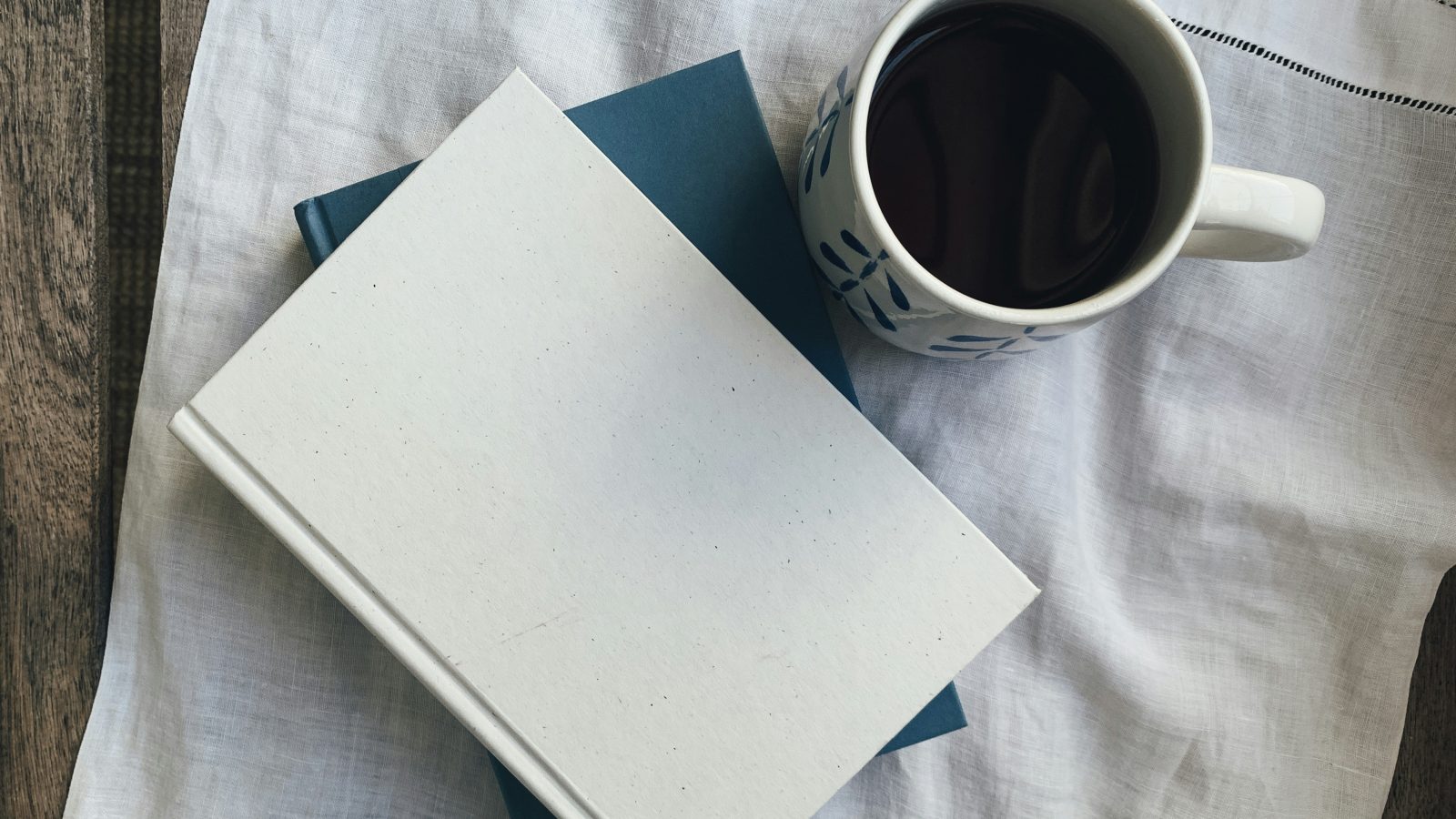 Coffee and books on a table