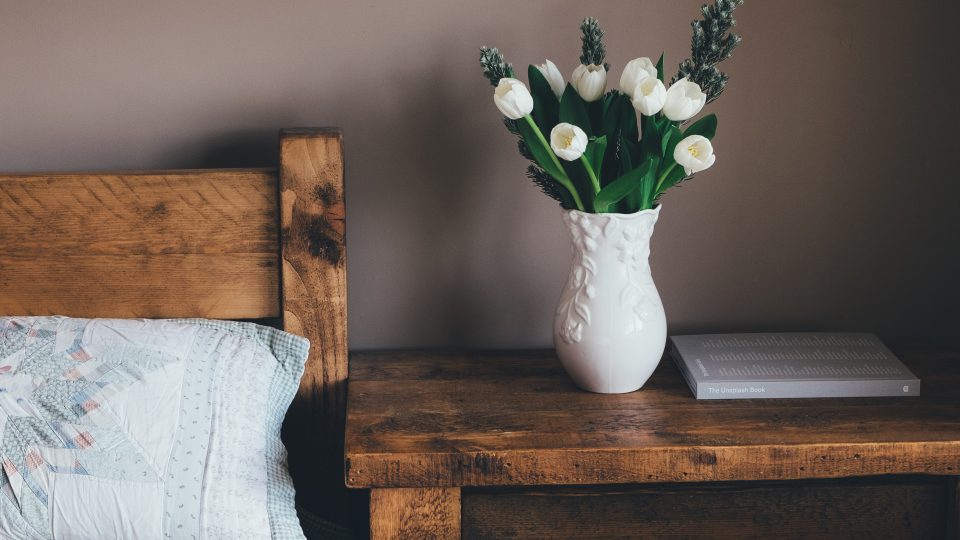 white flower vase on surface