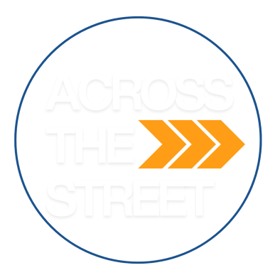 a black and white photo of a street sign