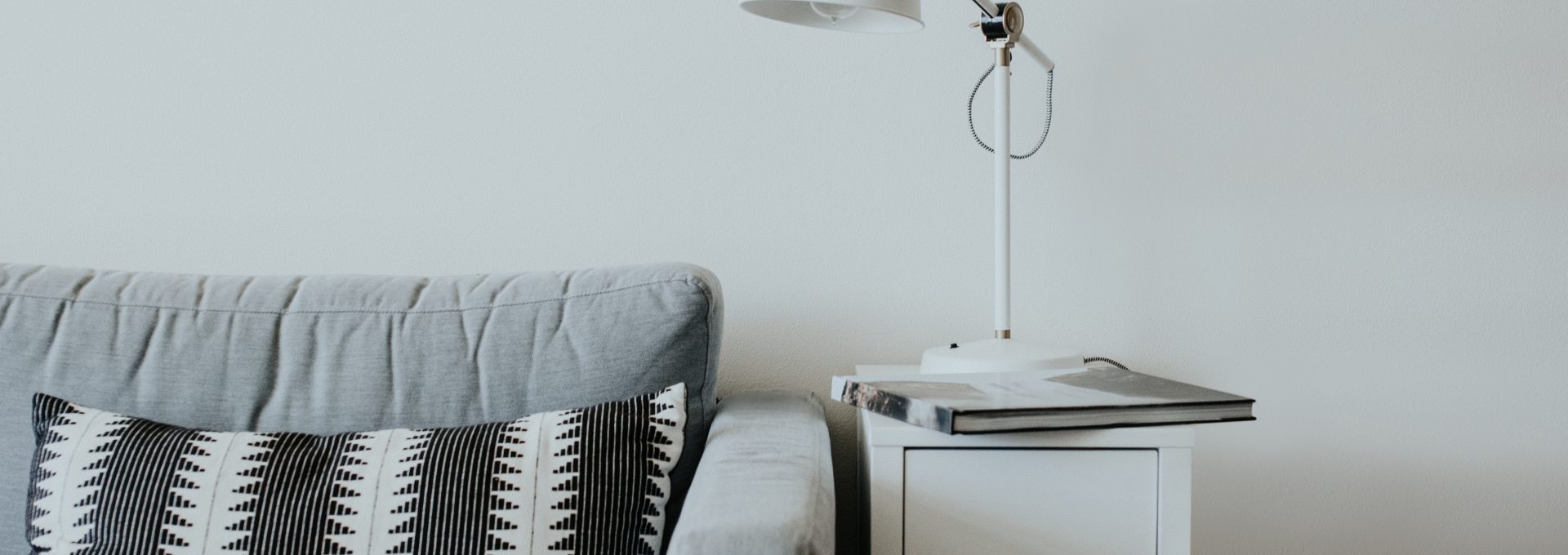 grey sofa reading lamp