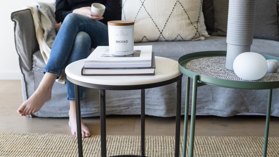 crossed legs sofa sitting