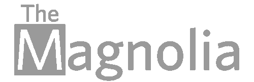 the magnolia logo on a gray background at The Magnolia