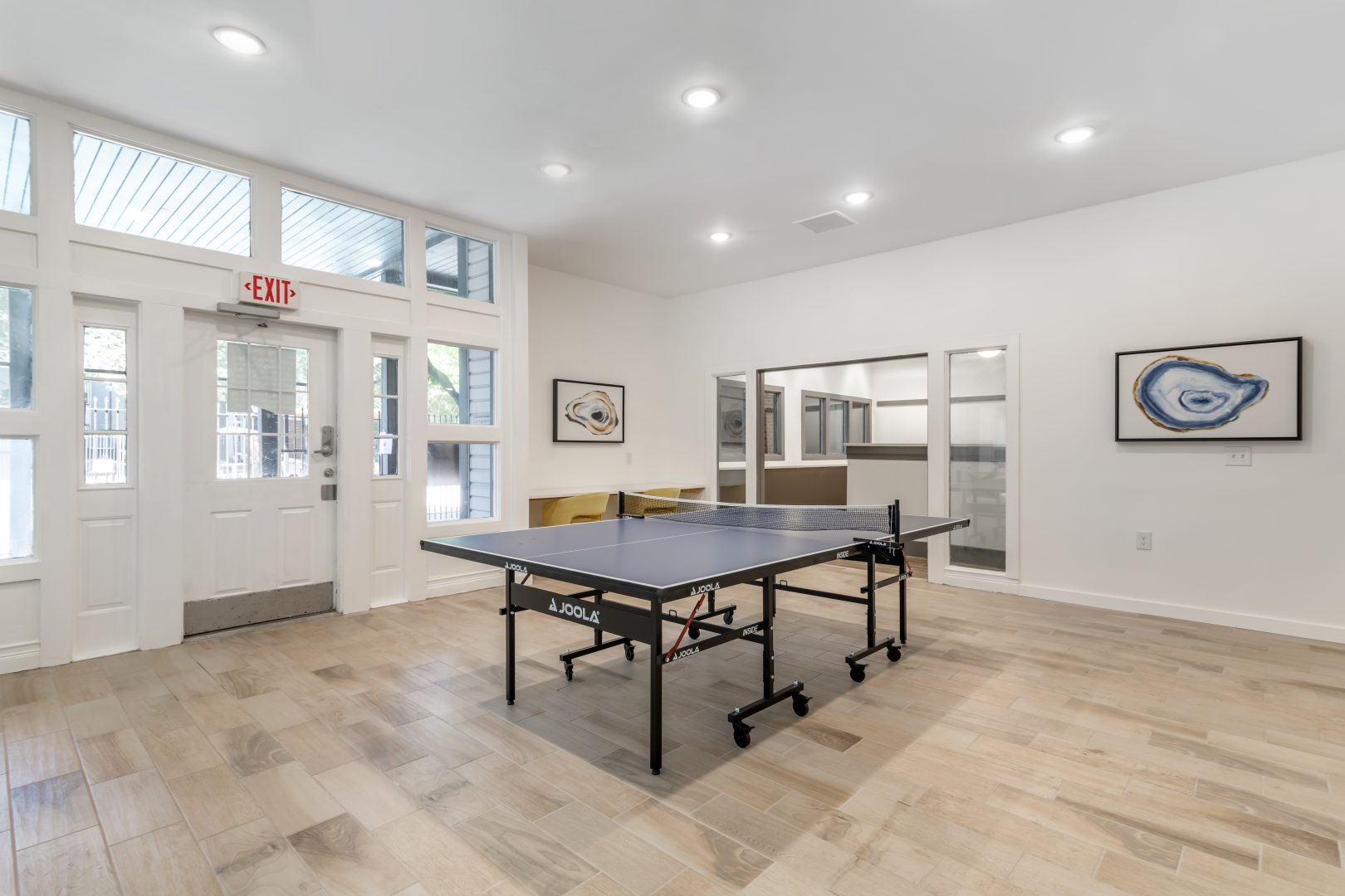 a ping pong table in a large room at The  Jaxon