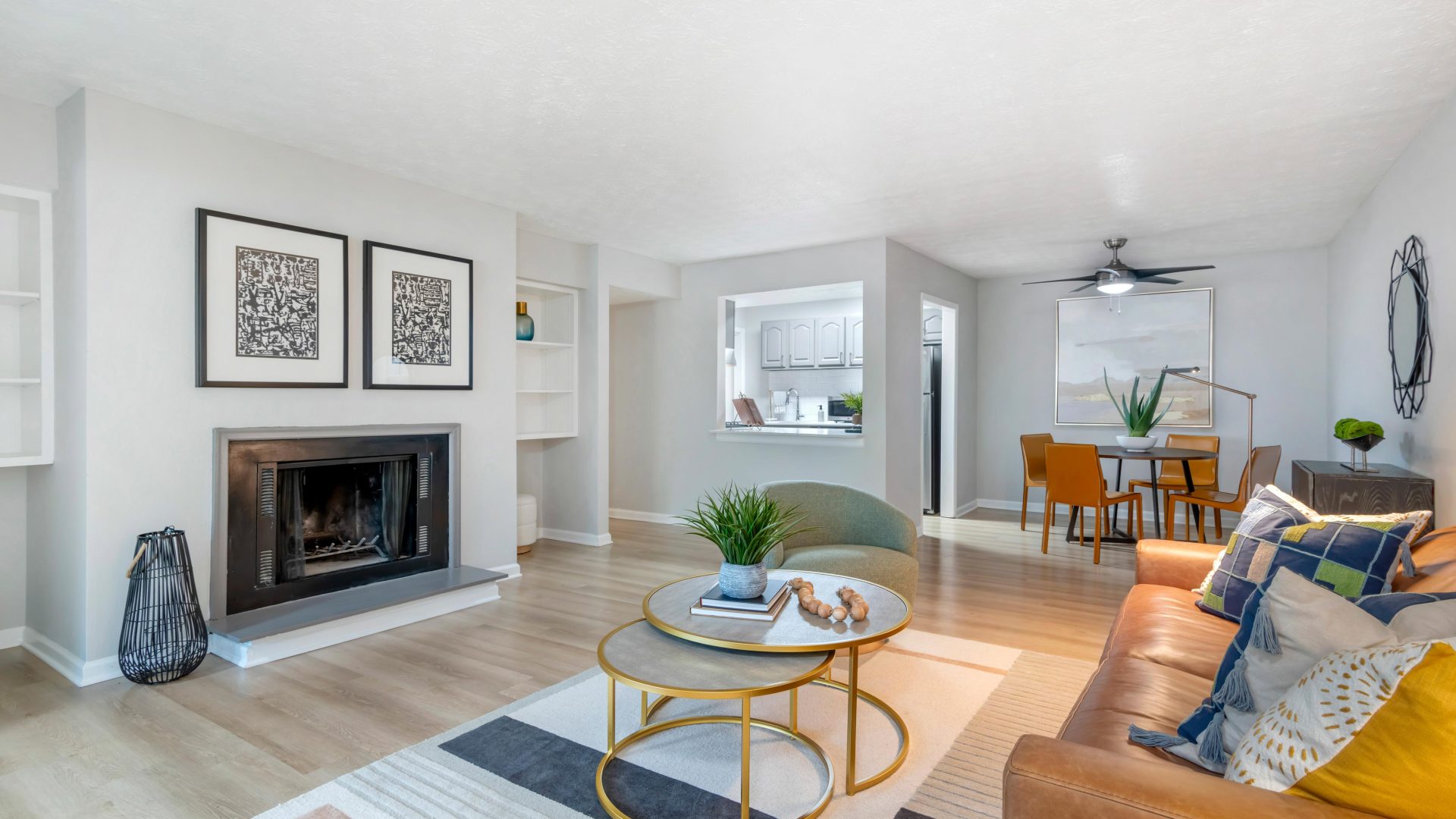 a living room with a fireplace and a couch at The  Bowie