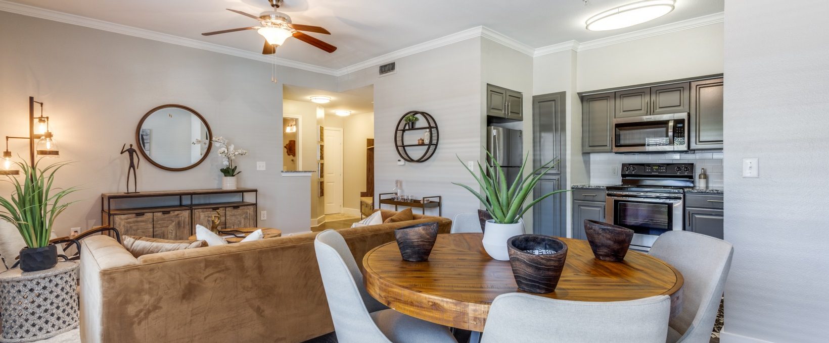 the living room and dining room are clean and well decorated at The Ellwood at Lake Travis