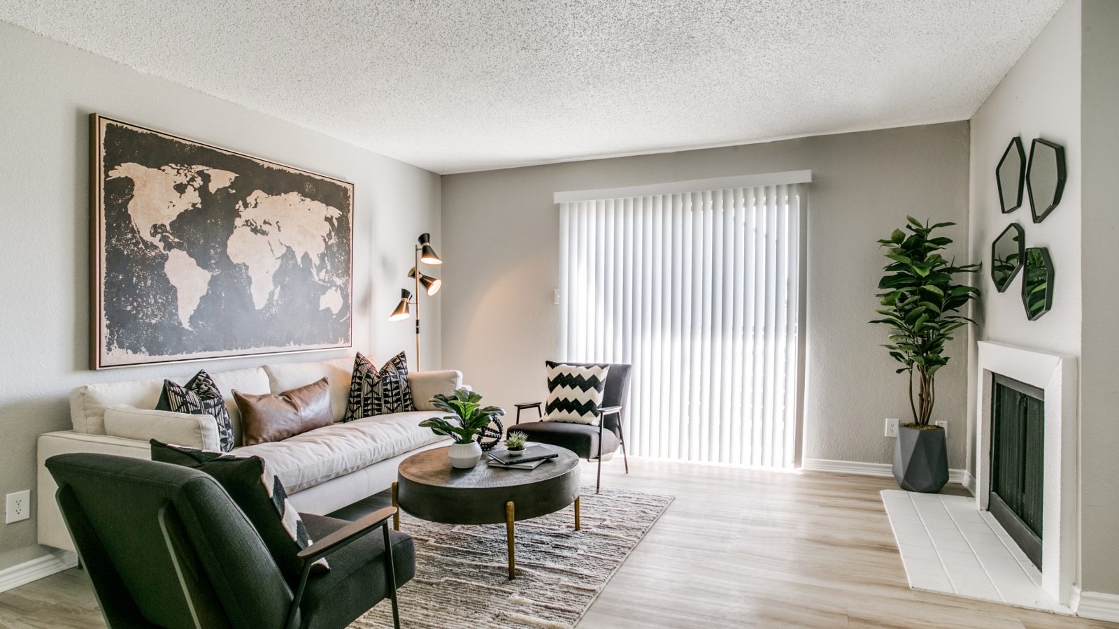 a living room with a large map on the wall at The  Holden