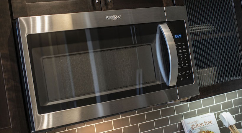a stainless steel microwave oven with a glass door at The Teak at  Branch
