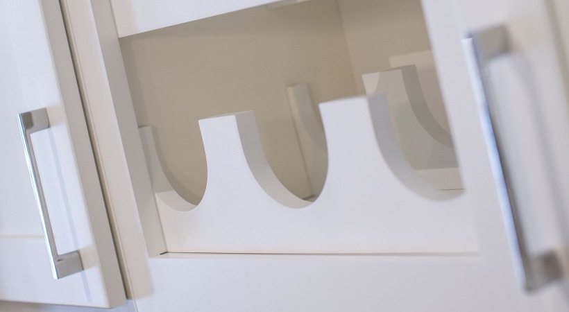 a white cabinet with a shelf and a handle at The Ash at  Branch