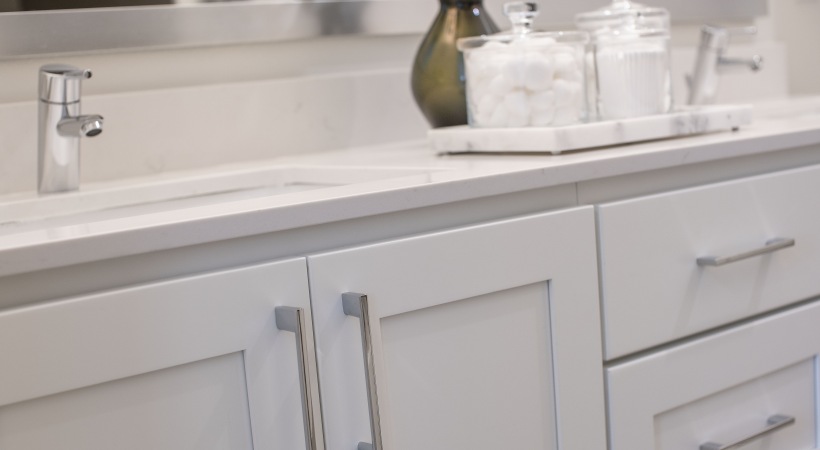 a bathroom vanity with two sinks and a mirror at The Ash at  Branch