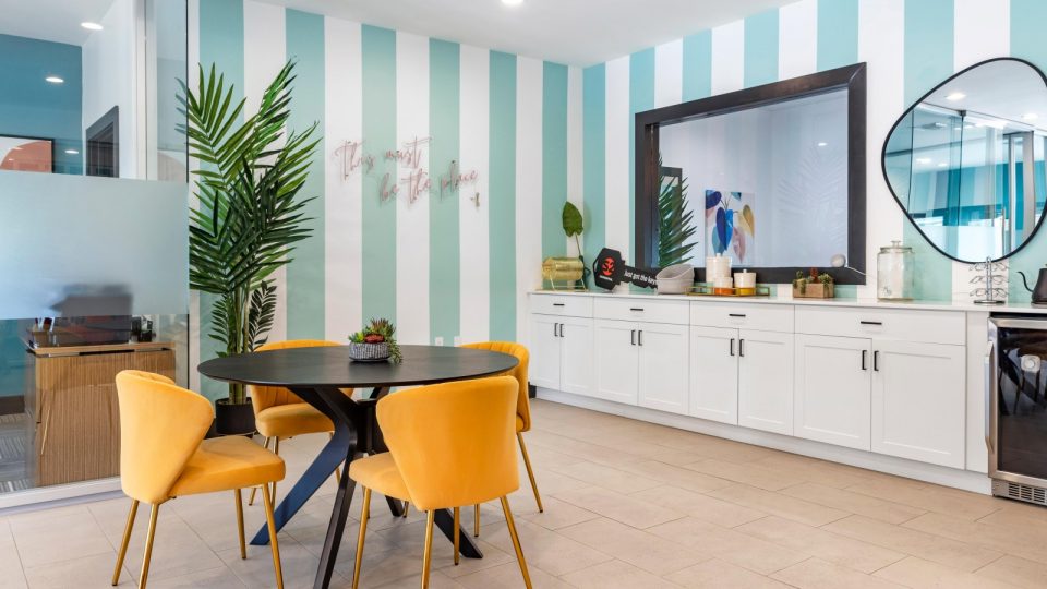 a kitchen with blue and white striped walls at The Marino