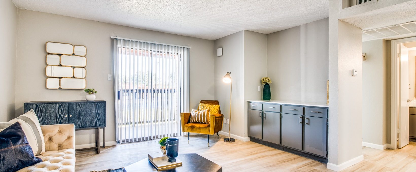 the living room has a couch, coffee table and television at The  Durham