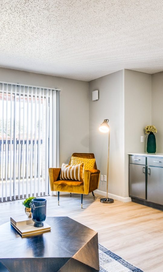 the living room has a couch, coffee table and television at The  Durham