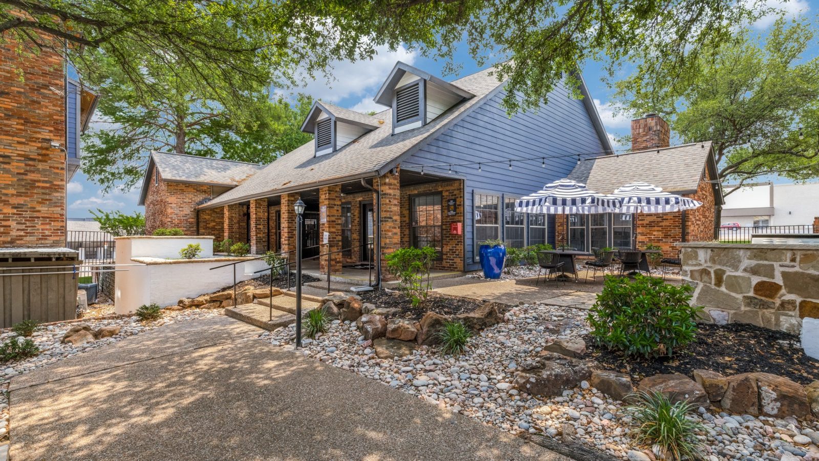 the front of a home with a patio and landscaping at The  Durham