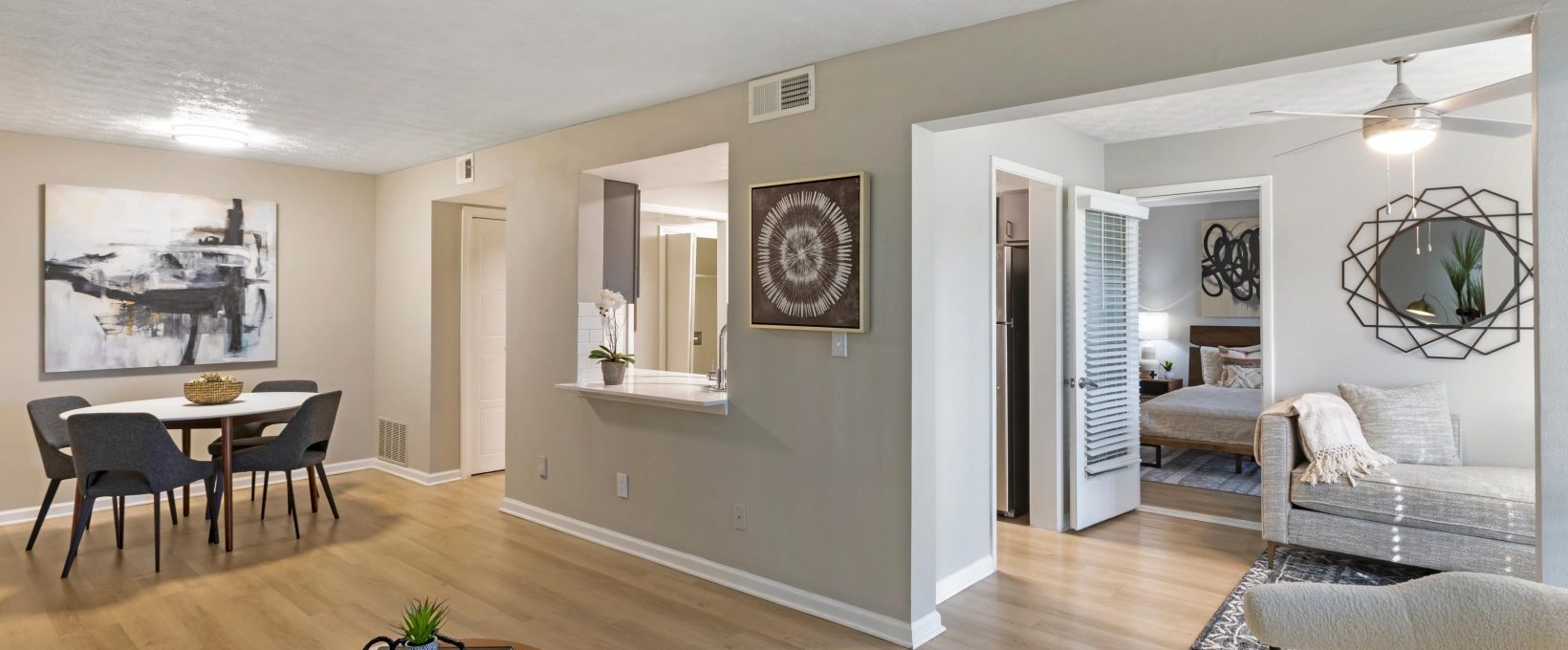 a clean living room and dining area in an apartment at The The Breck