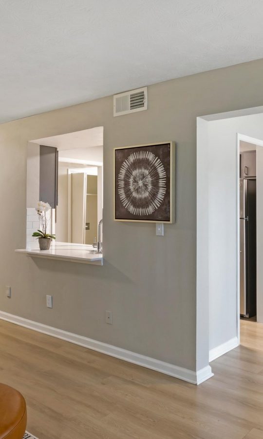 a clean living room and dining area in an apartment at The The Breck