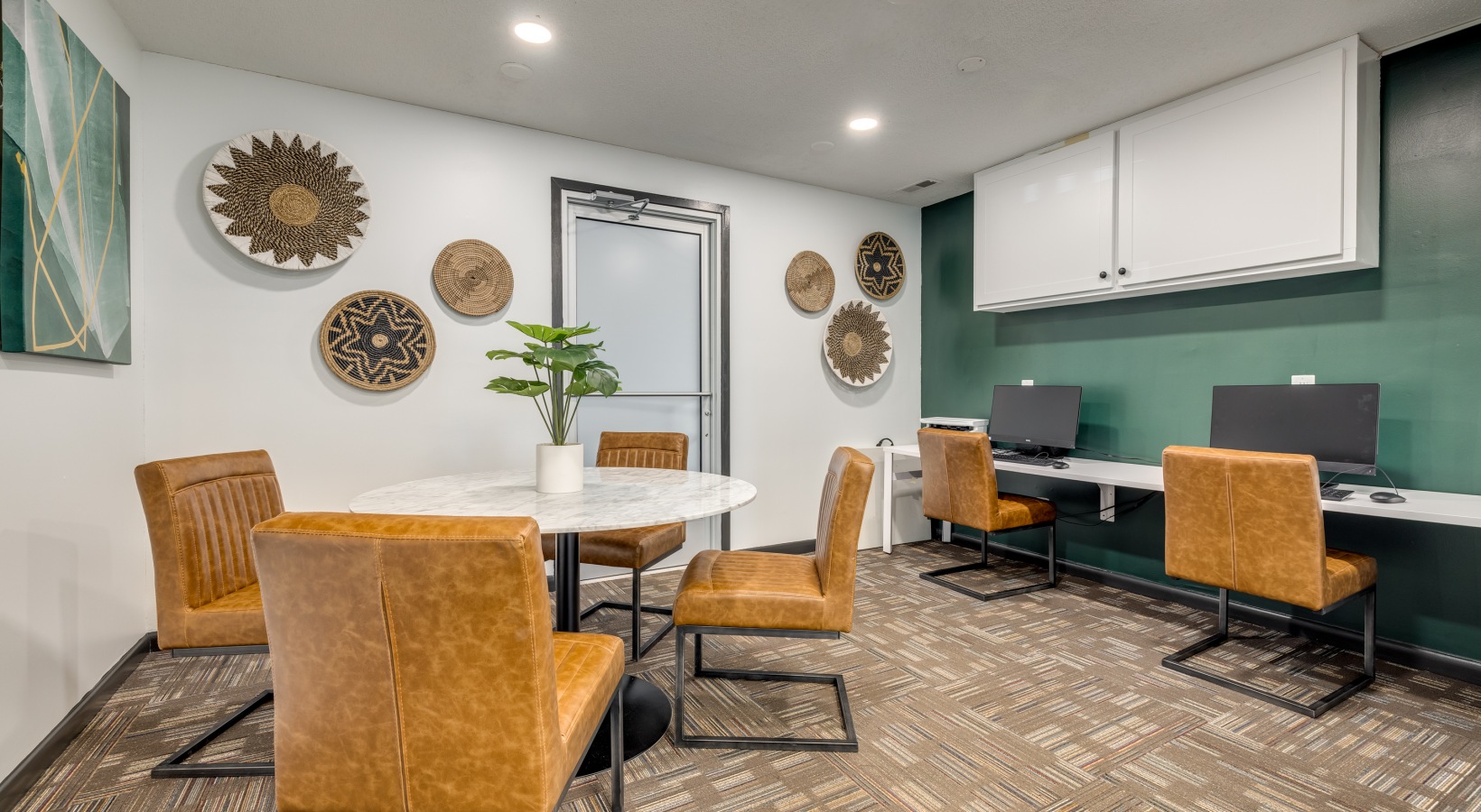 a conference room with chairs and a table at The Quinn on Ravenglass
