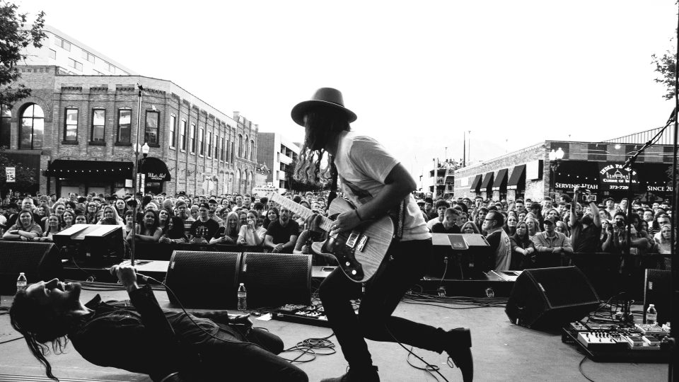 grayscale photography of concert during daytime