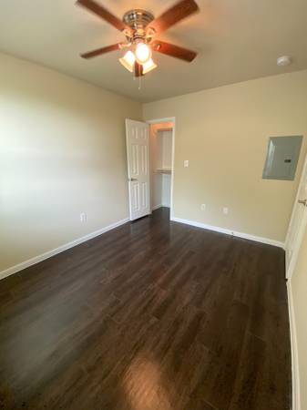 Wood-look flooring at Esperanza at Wilson Road Apartments in Humble, TX