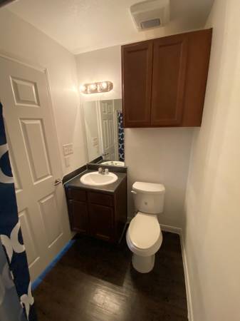 Bathrooms with Vanity at Esperanza at Wilson Road Apartments in Humble, Texas