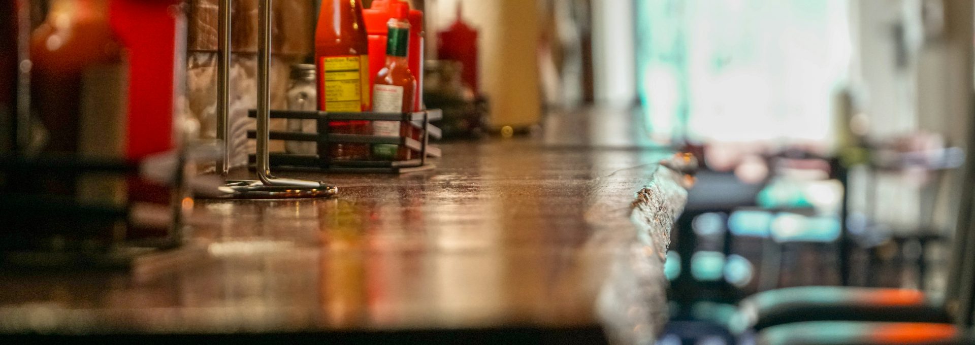 selective focus photography of bottles on table