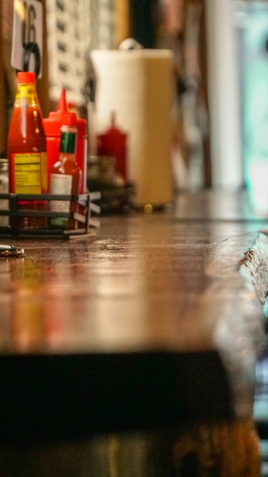 selective focus photography of bottles on table
